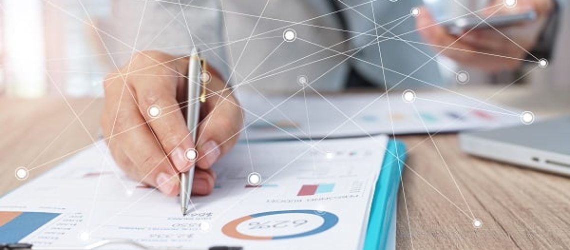 Businessman analyzing investment charts with laptop. Accounting Businessman analyzing investment charts with laptop. Accounting